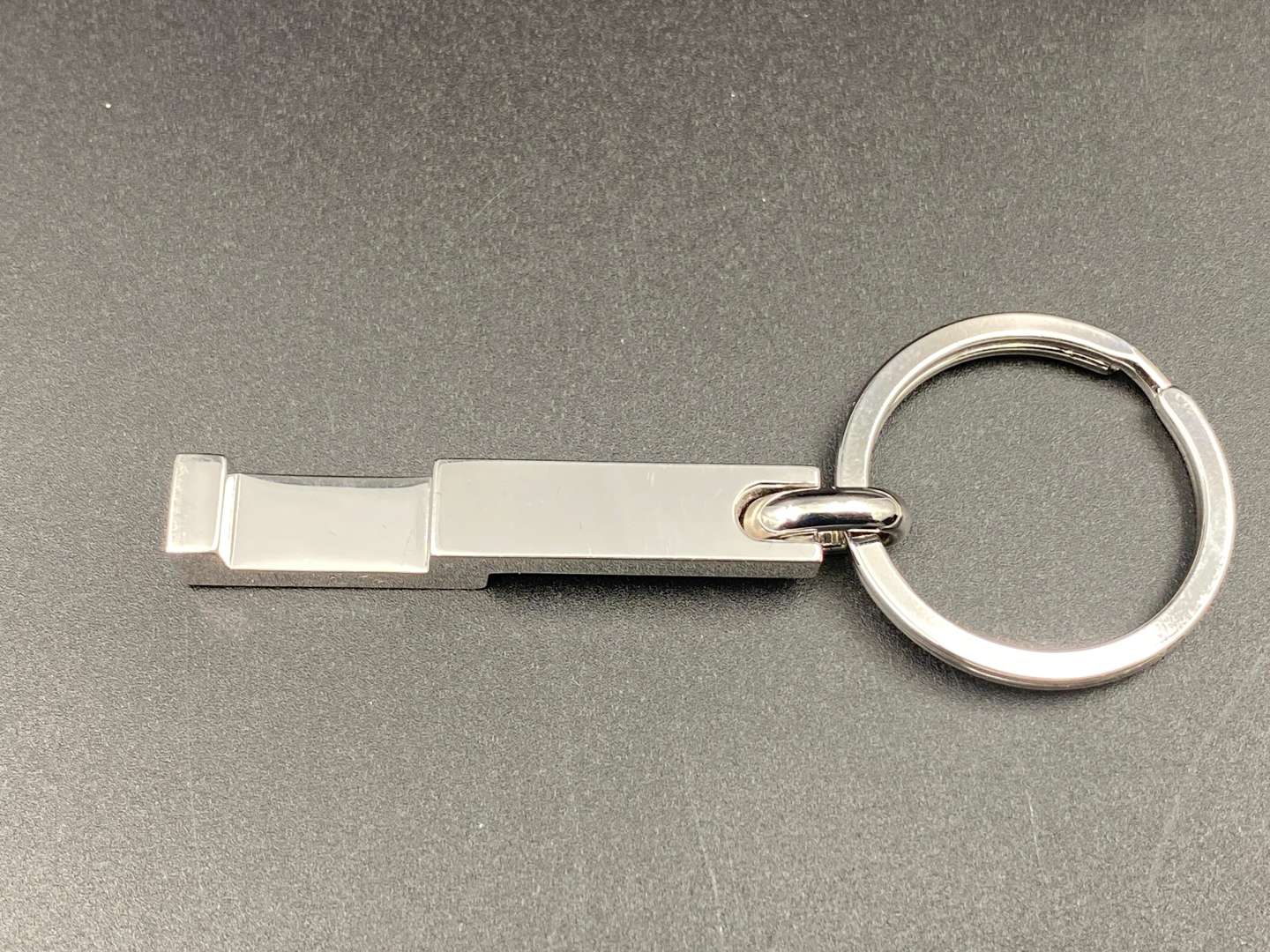 <p>DUNHILL, a modern silver and chrome metal keyring,</p>