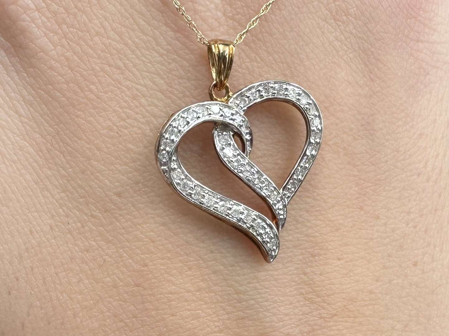 <p>Gold and Diamond Heart&nbsp;Pendant on Gold Chain</p>