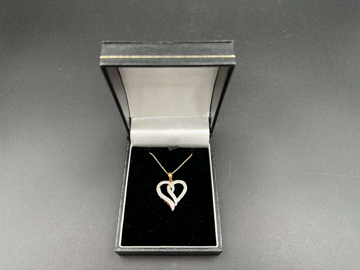 <p>Gold and Diamond Heart&nbsp;Pendant on Gold Chain</p>
