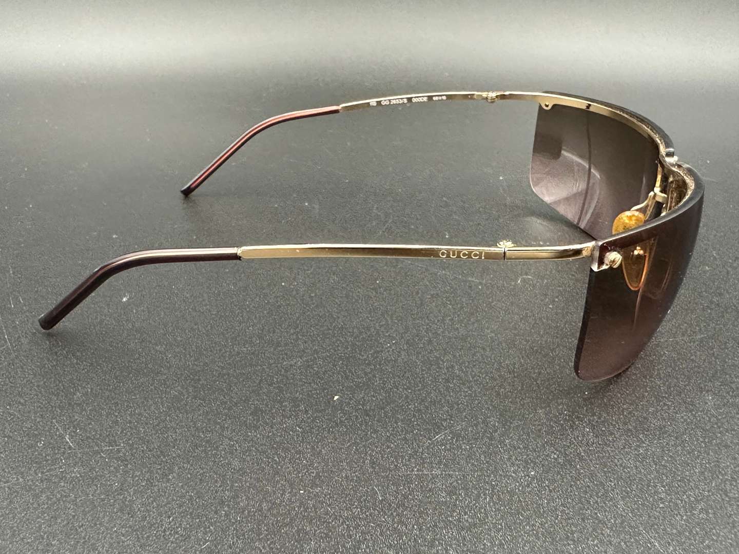 <p>GUCCI, cased pair of gilt framed sunglasses, GG 2653/S</p>