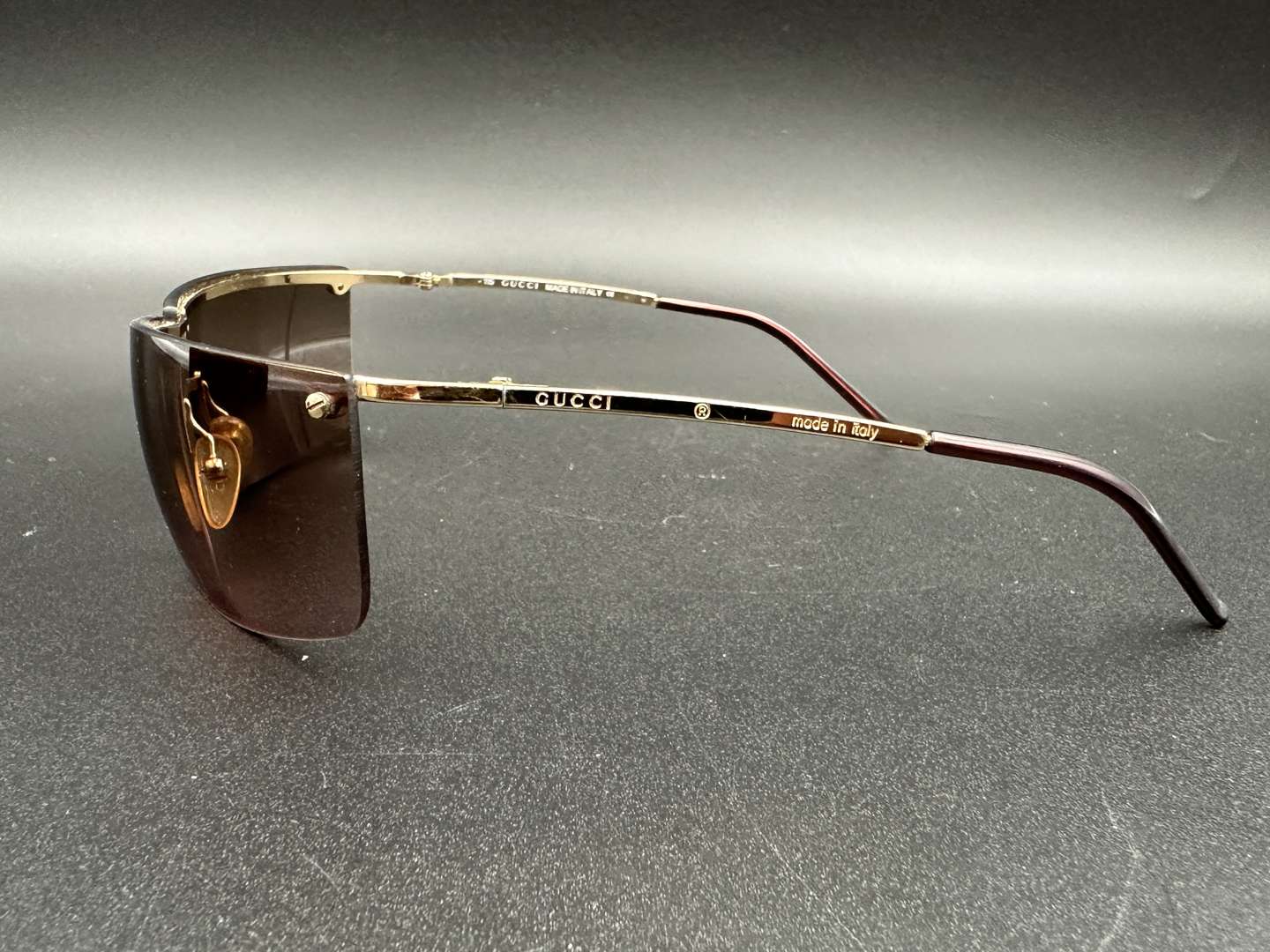 <p>GUCCI, cased pair of gilt framed sunglasses, GG 2653/S</p>