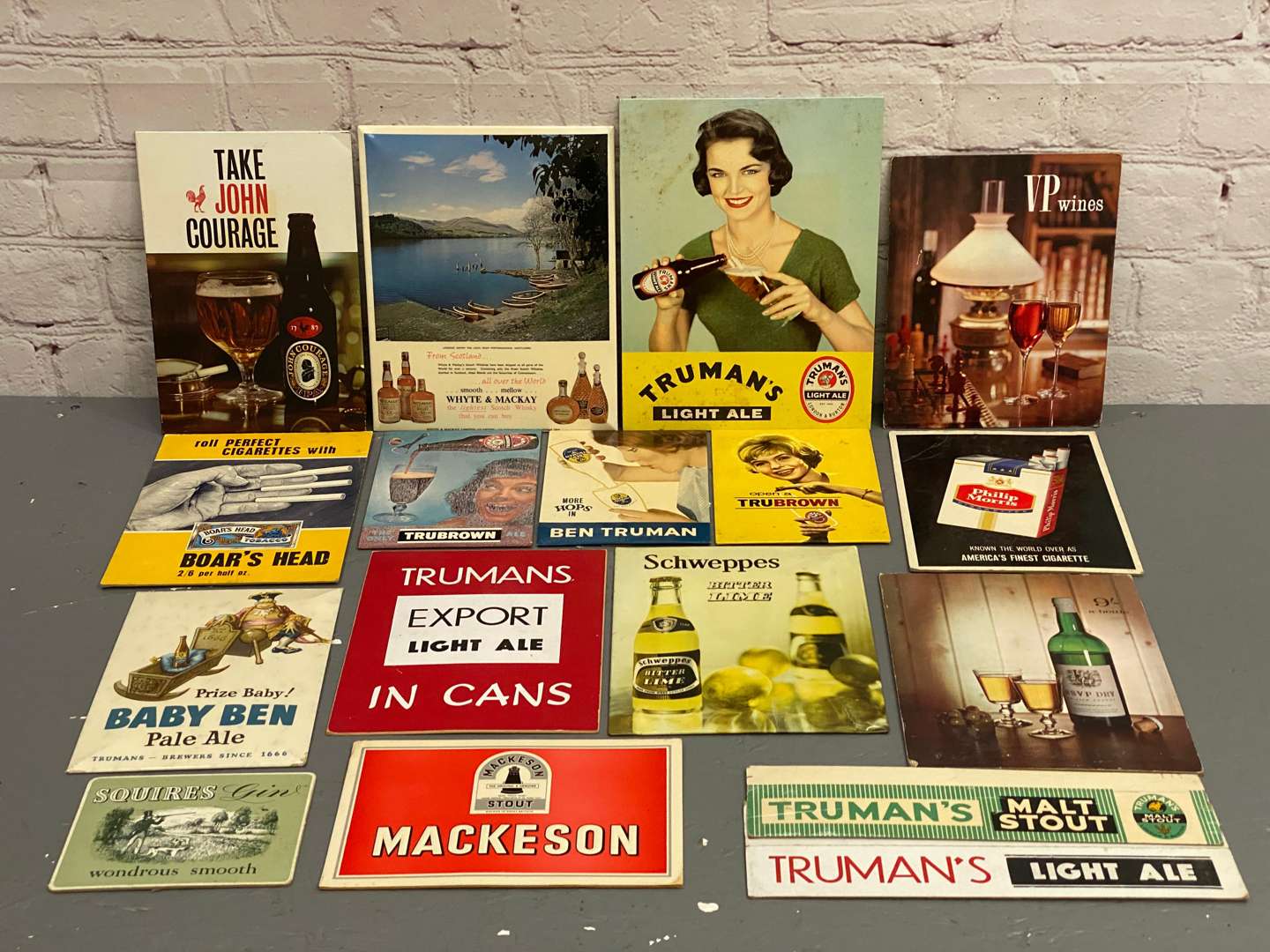 <p>A mixed lot of vintage, alcohol related, point of sale advertising,&nbsp;</p>