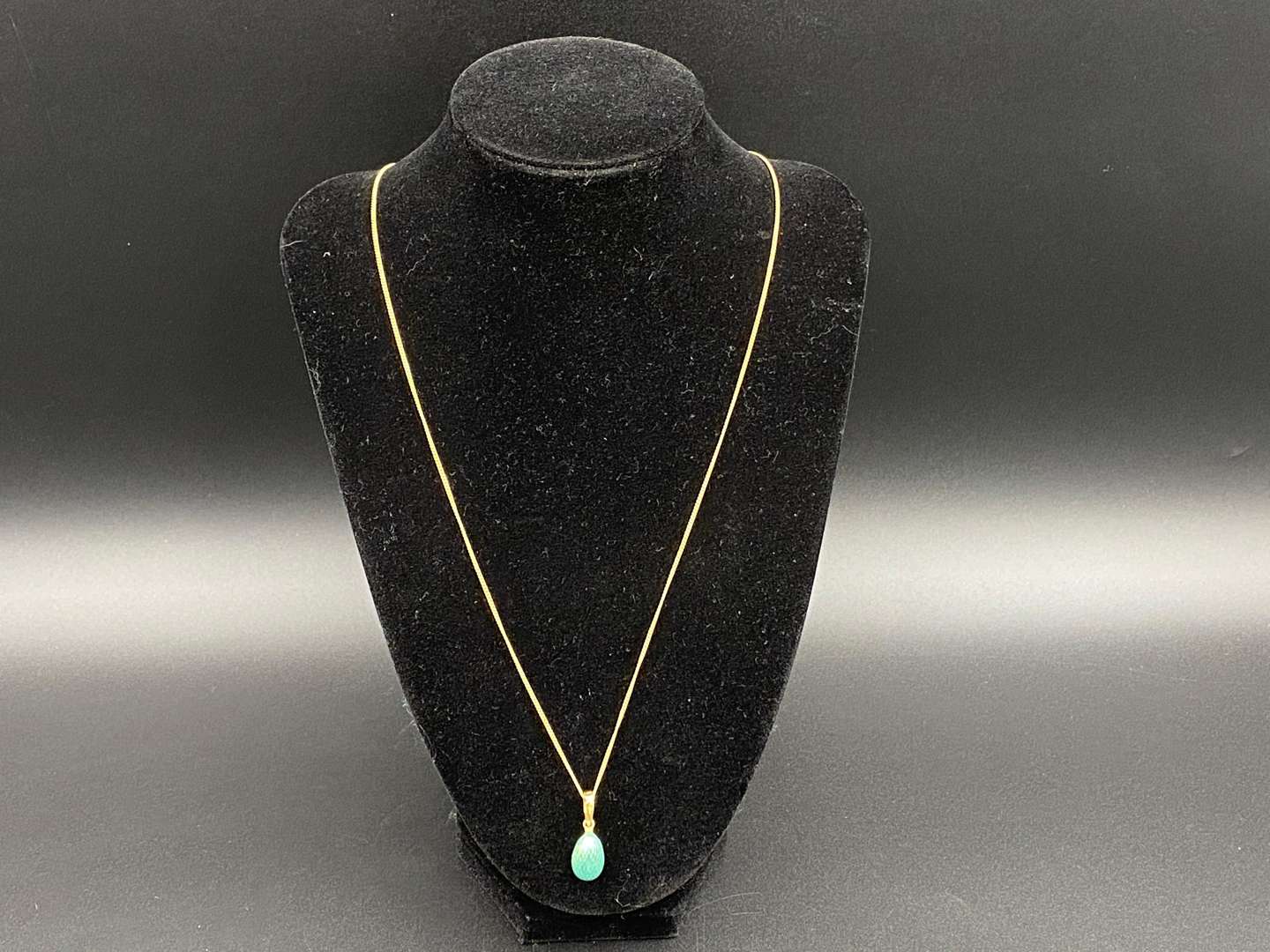 <p>FABERGE, a .750 and enamel Egg pendant, 241/500</p>