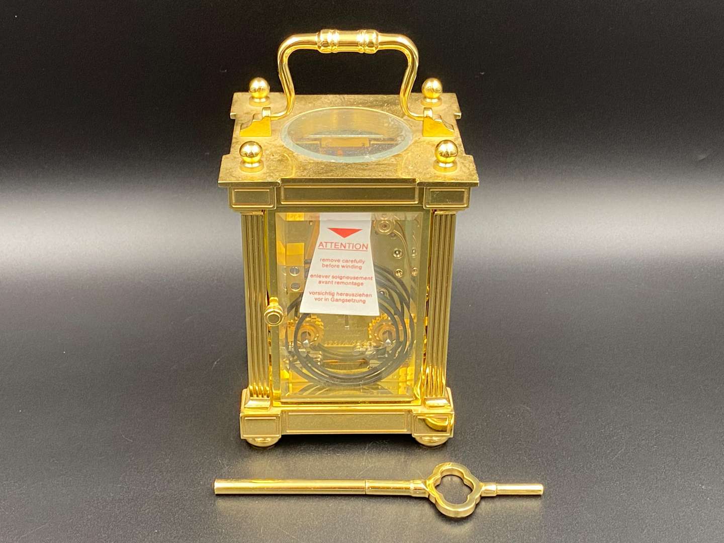 <p>MATTHEW NORMAN, a modern, Swiss, lacquered brass carriage clock, 1751A/50A, 14514</p>