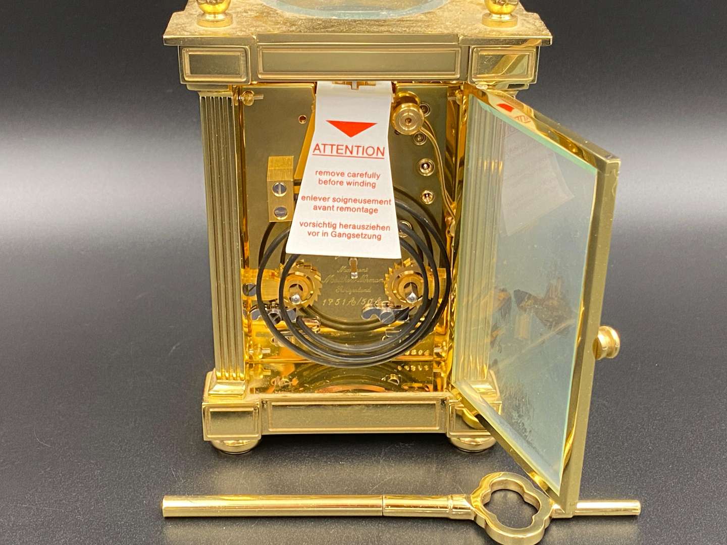 <p>MATTHEW NORMAN, a modern, Swiss, lacquered brass carriage clock, 1751A/50A, 14514</p>