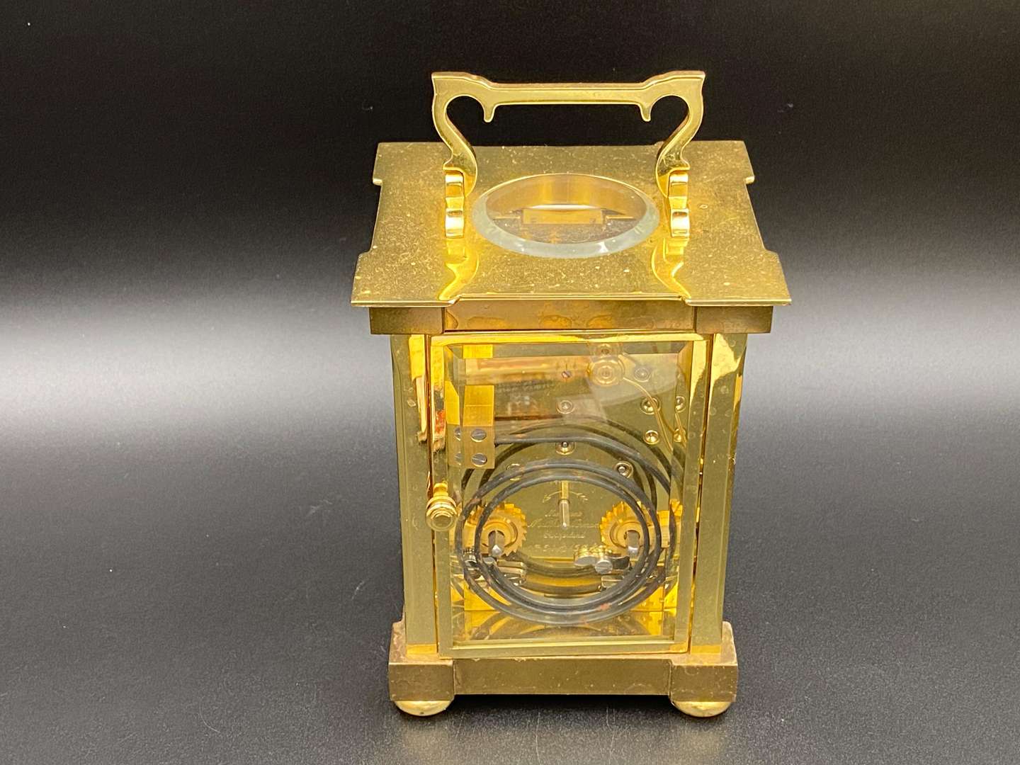 <p>MATTHEW NORMAN, a modern, Swiss, lacquered brass carriage clock, 1751A/50A, 13114</p>