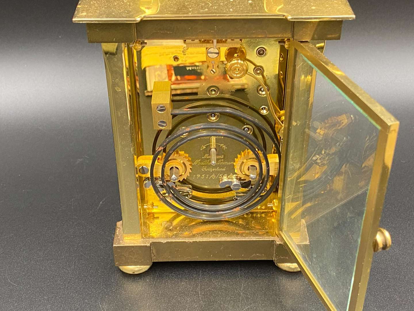 <p>MATTHEW NORMAN, a modern, Swiss, lacquered brass carriage clock, 1751A/50A, 13114</p>