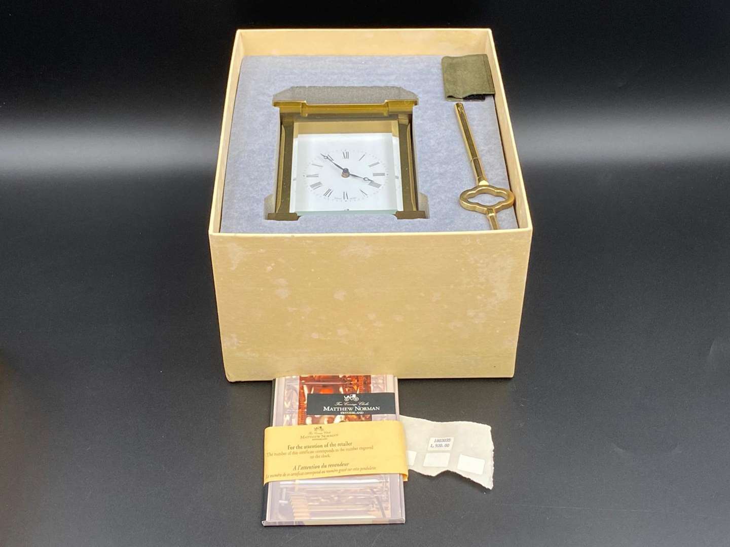 <p>MATTHEW NORMAN, a modern, Swiss, lacquered brass carriage clock, 1751A/50A, 13114</p>