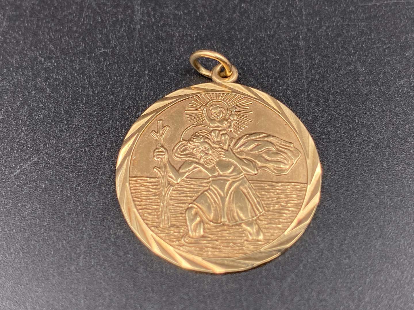 <p>9ct gold St Christopher medallion</p>