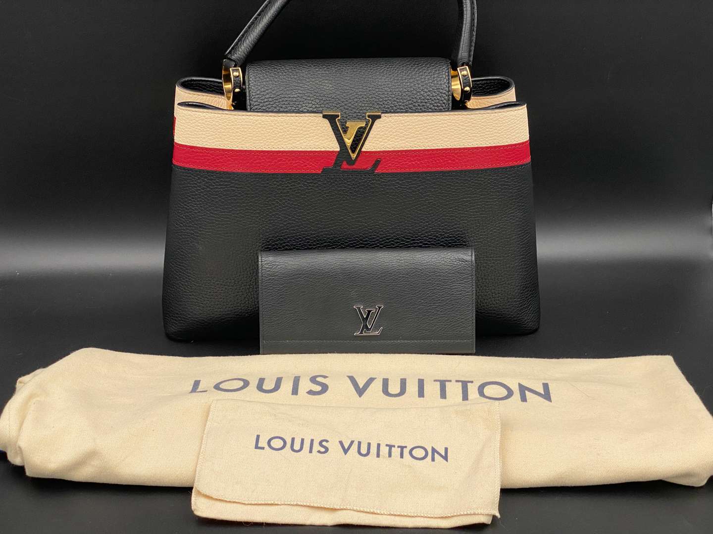 <p>LOUIS VUITTON, Capucine, tri-colour leather handbag and purse,</p>