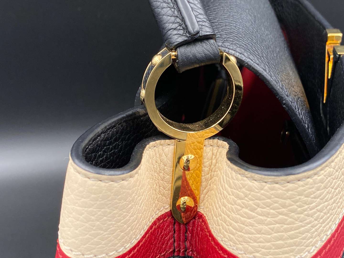 <p>LOUIS VUITTON, Capucine, tri-colour leather handbag and purse,</p>