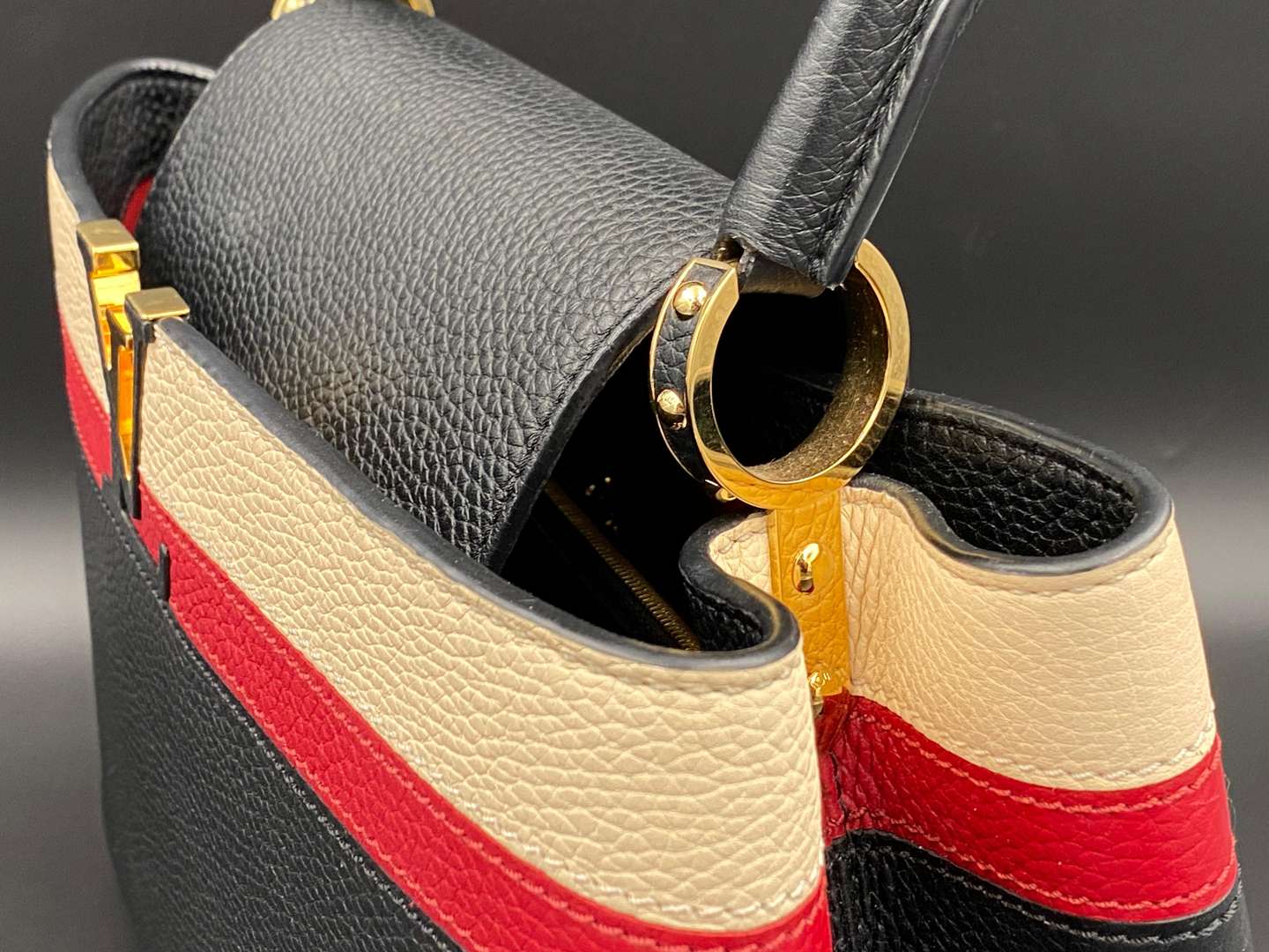 <p>LOUIS VUITTON, Capucine, tri-colour leather handbag and purse,</p>