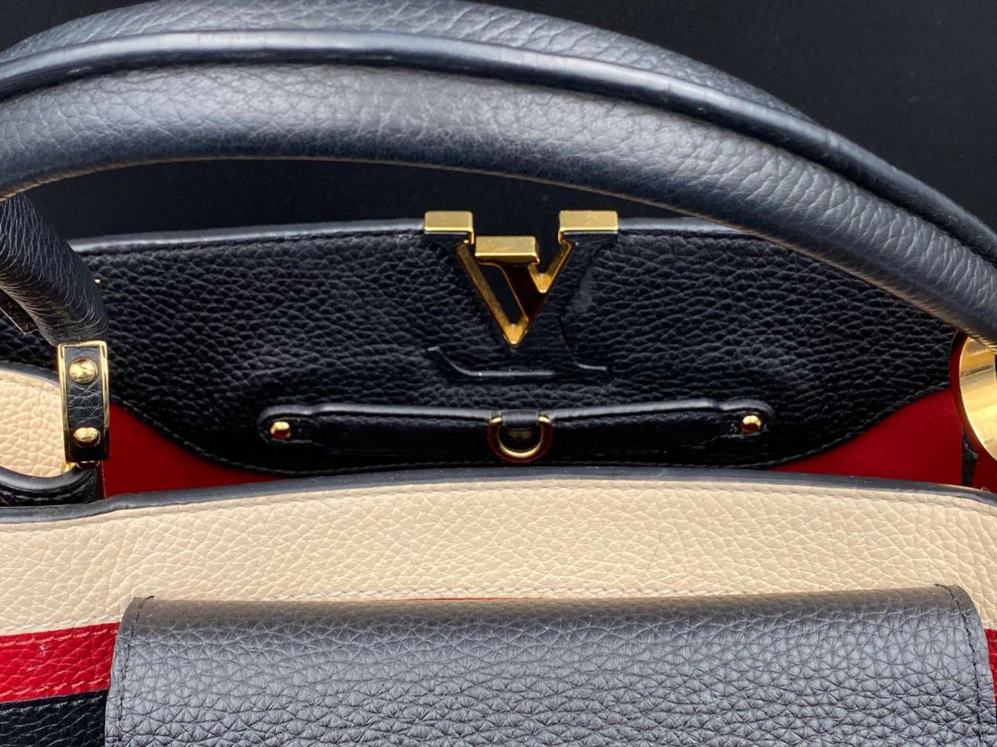 <p>LOUIS VUITTON, Capucine, tri-colour leather handbag and purse,</p>