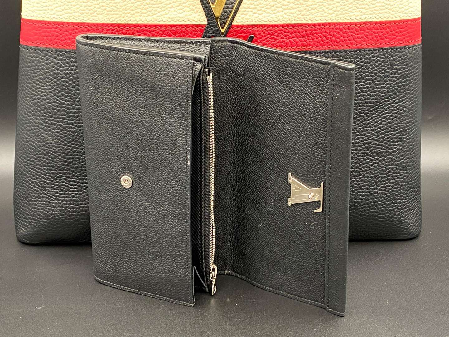 <p>LOUIS VUITTON, Capucine, tri-colour leather handbag and purse,</p>