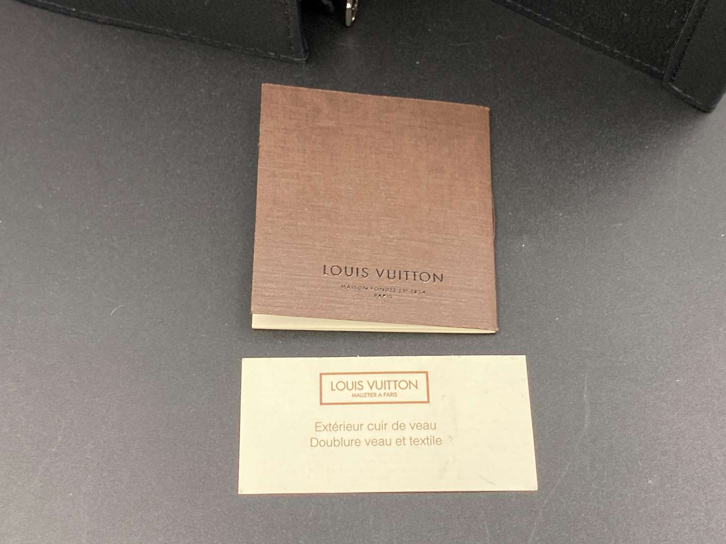 <p>LOUIS VUITTON, Capucine, tri-colour leather handbag and purse,</p>