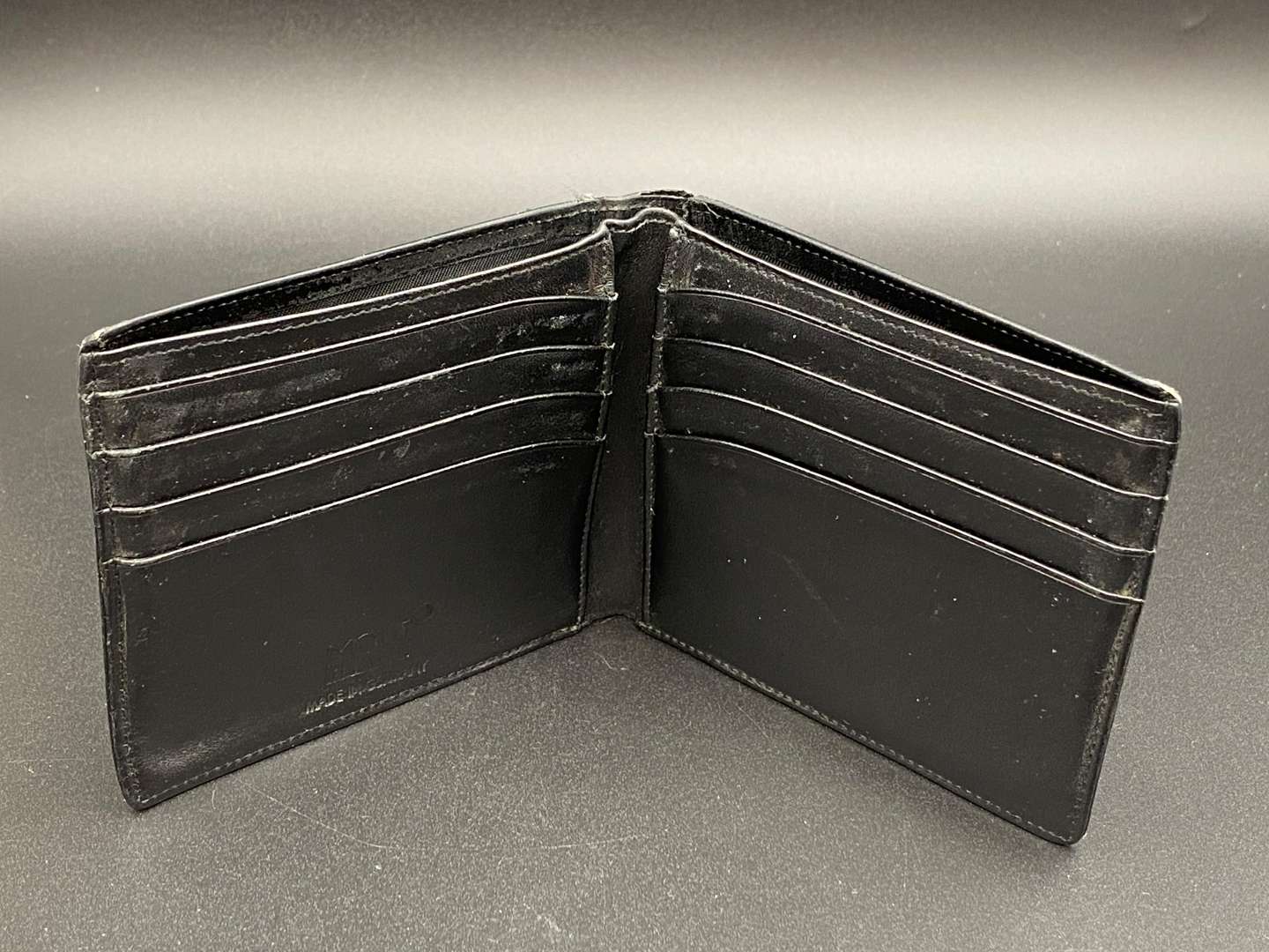 <p>MONT BLANC, a black leather wallet,</p>