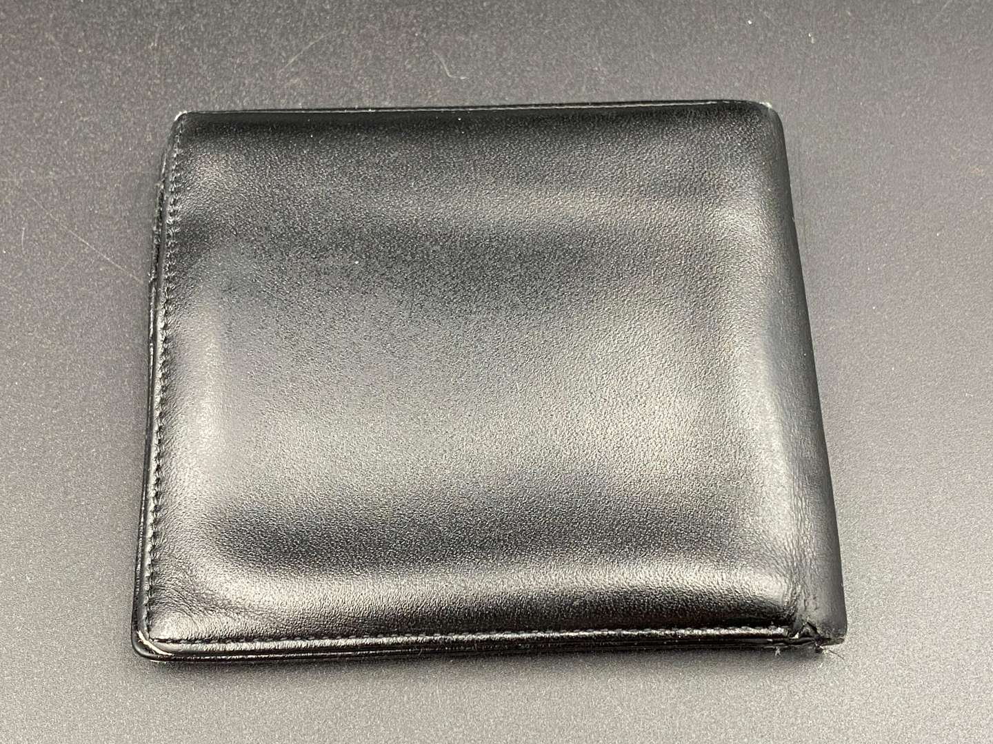 <p>MONT BLANC, a black leather wallet,</p>