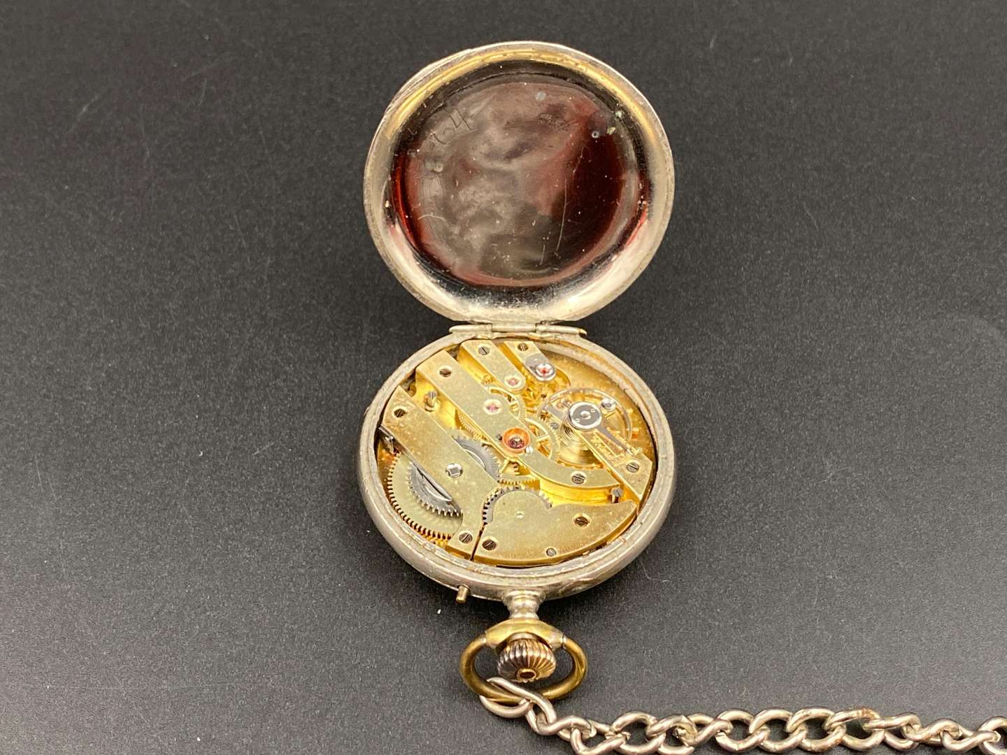 <p>Early 20th century, plated, base metal cased, open face, keyless pocket watch,&nbsp;</p>