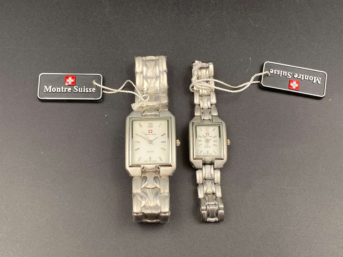 <p>MOTRE SUISSE, gents & ladies, stainless steel wristwatches,</p>