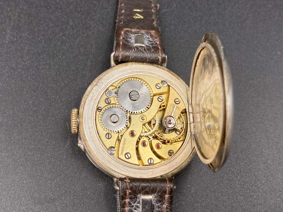 <p>An early 20th century Swiss, silver cased wrist watch,</p>