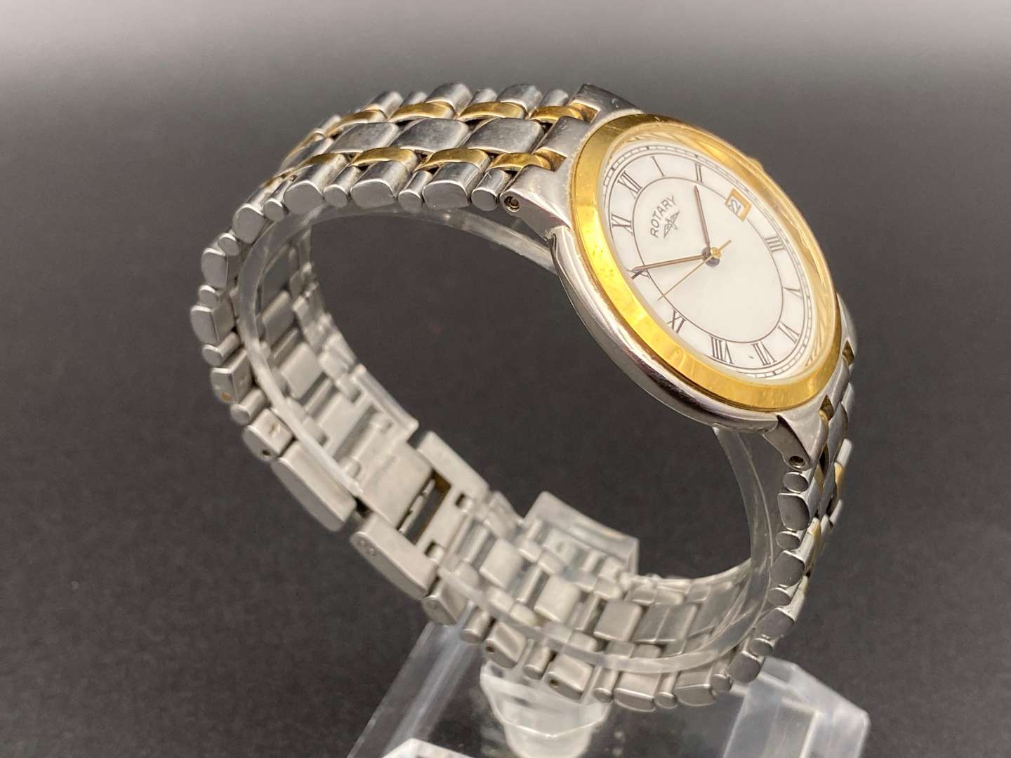 <p>ROTARY, steel & gold plated, quartz, calendar wristwatch, UCAR311, Ref 5021</p>
