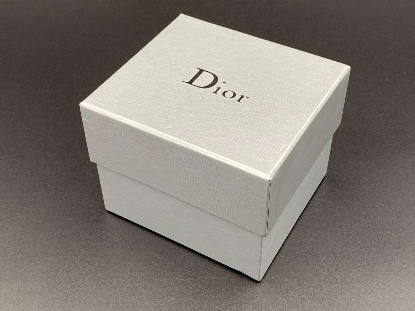 <p>CHRISTIAN DIOR, signed perspex and silvered studded cuff bracelet</p>