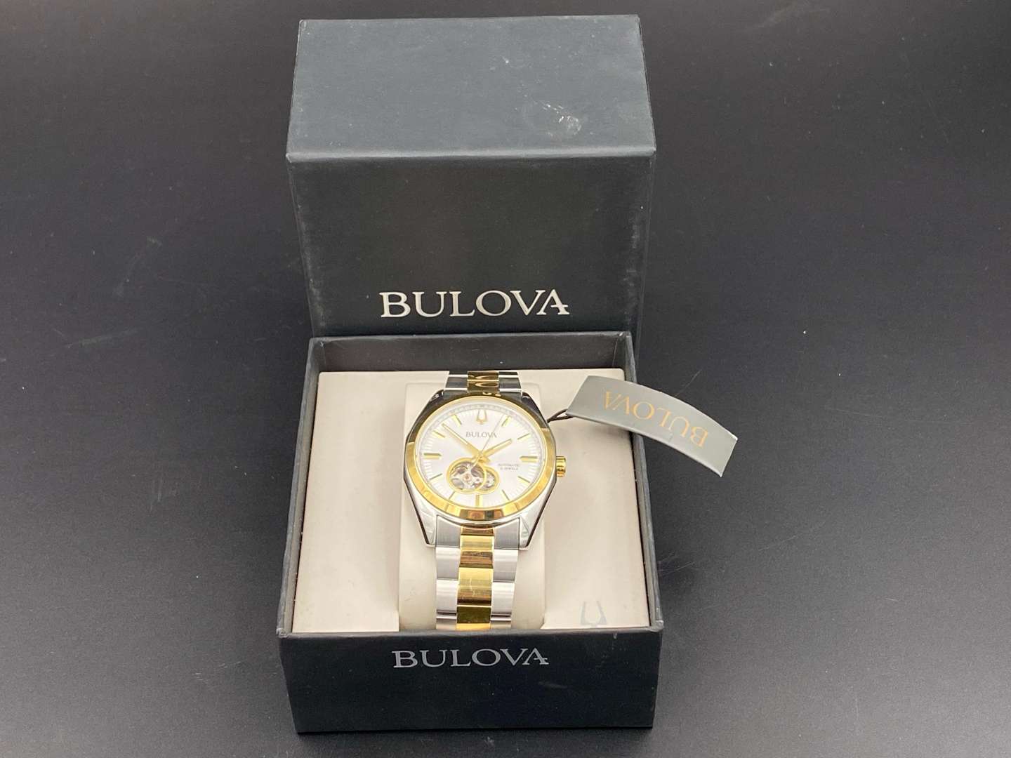 <p>BULOVA, stainless steel and gilt, automatic, centre seconds wristwatch, 98A284, C9692233</p>