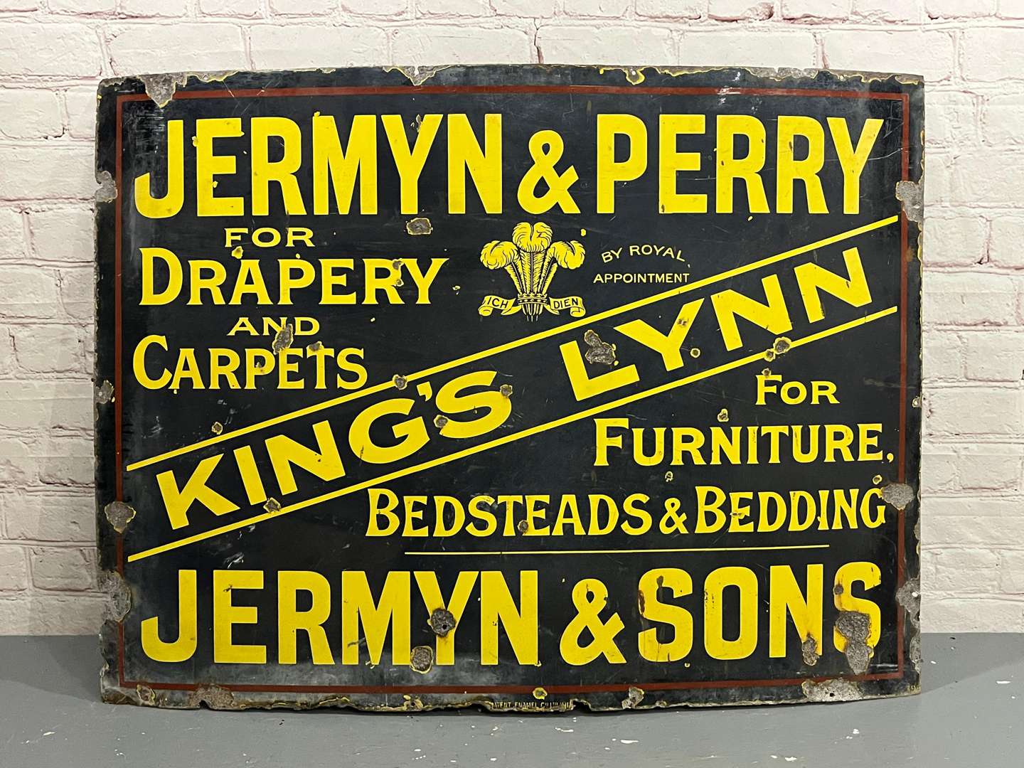 <p>Jermyn & Perry of Kings Lynn By Royal Appointment Enamel Sign&nbsp;</p>