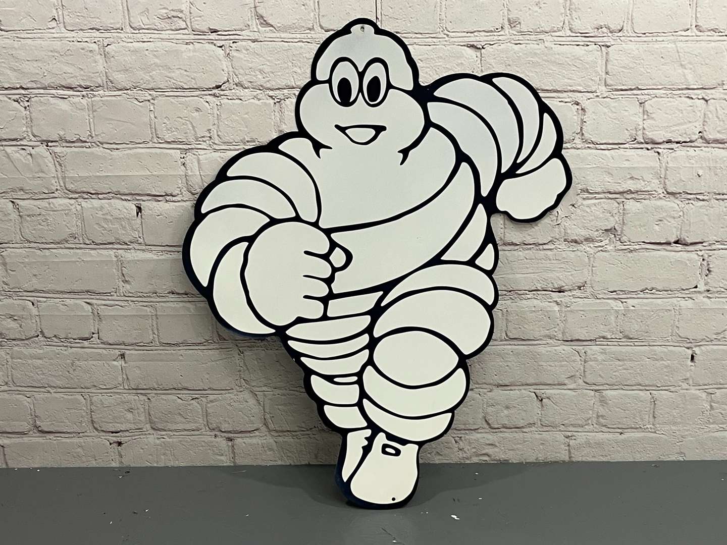 <p>Michelin Running Man Metal Sign</p>