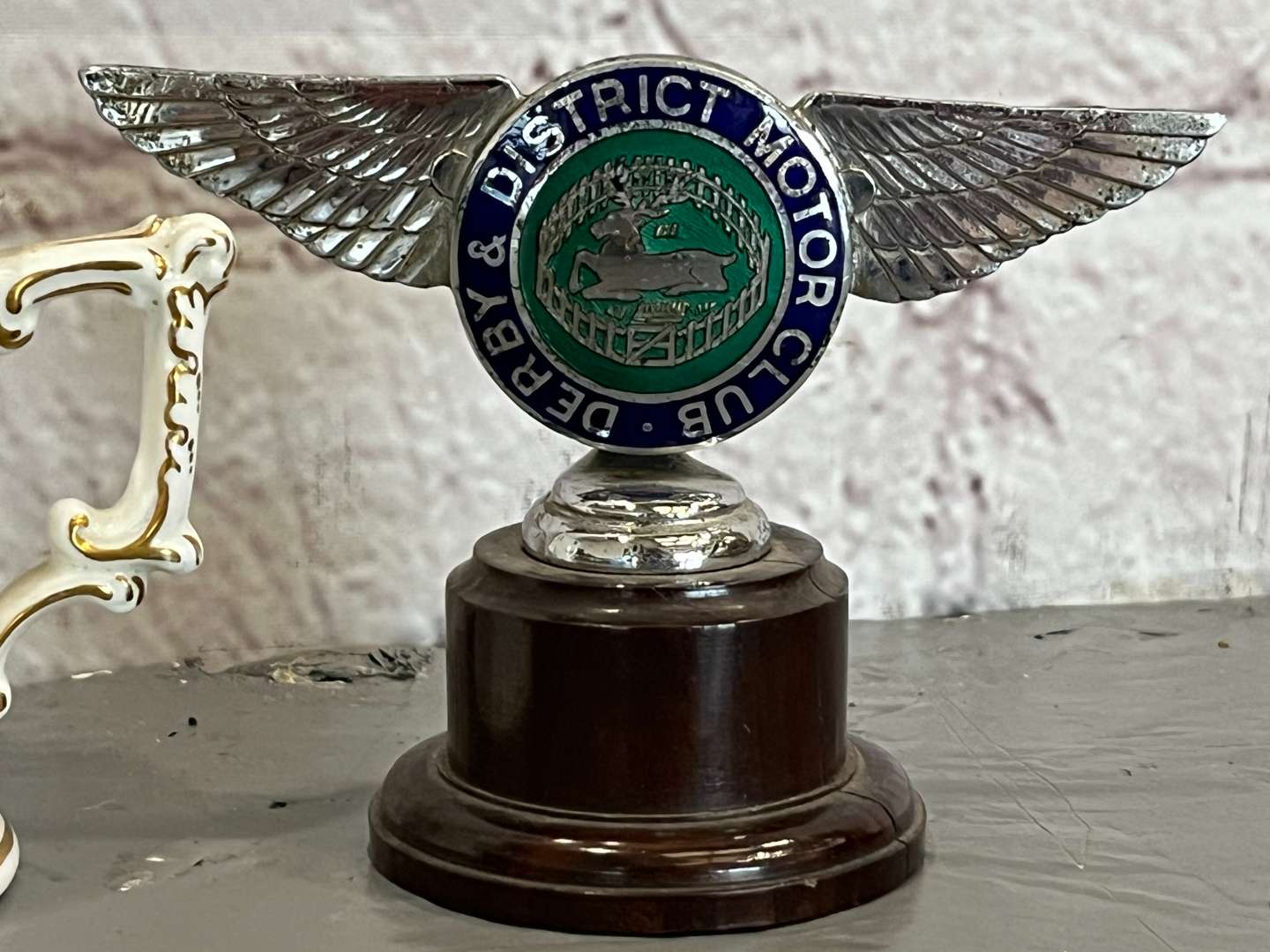 <p>Derby District Motor Club Mascot, Badge and Crown Derby Two Handled Mug (3)</p>