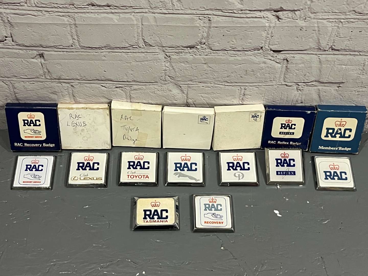 <p>Nine RAC Badges To Include, Tasmania/Two Recovery/Daimler/Lexus/Toyota/Jaguar/Reflex Etc</p>