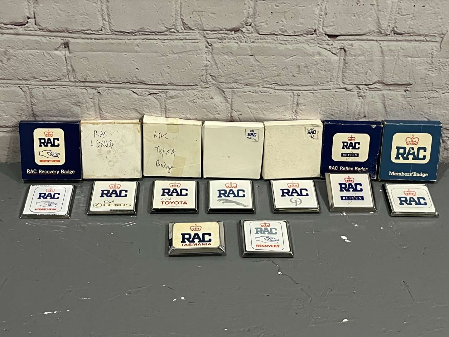 <p>Nine RAC Badges To Include, Tasmania/Two Recovery/Daimler/Lexus/Toyota/Jaguar/Reflex Etc</p>