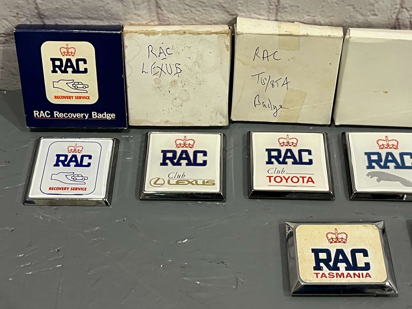 <p>Nine RAC Badges To Include, Tasmania/Two Recovery/Daimler/Lexus/Toyota/Jaguar/Reflex Etc</p>