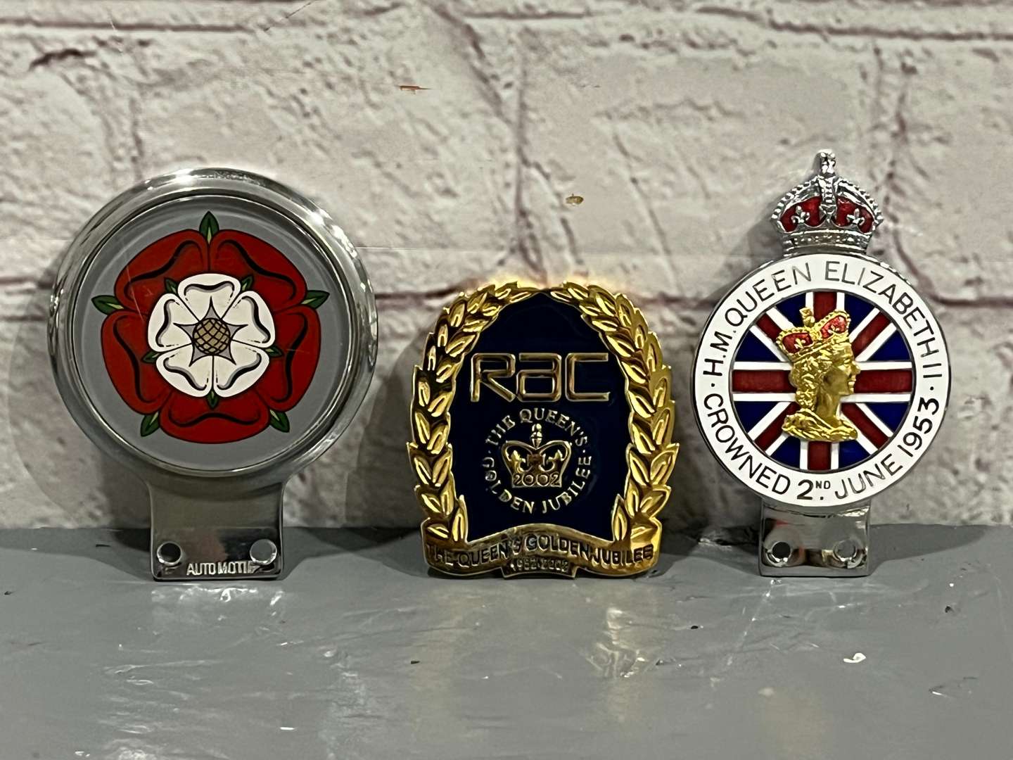 <p>Three RAC Car Badges&nbsp;</p>