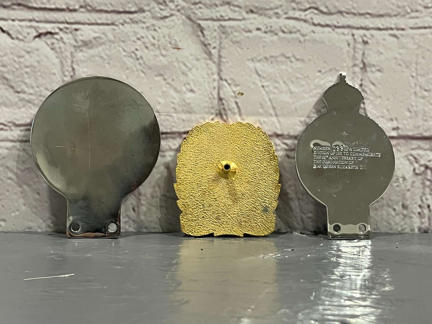 <p>Three RAC Car Badges&nbsp;</p>