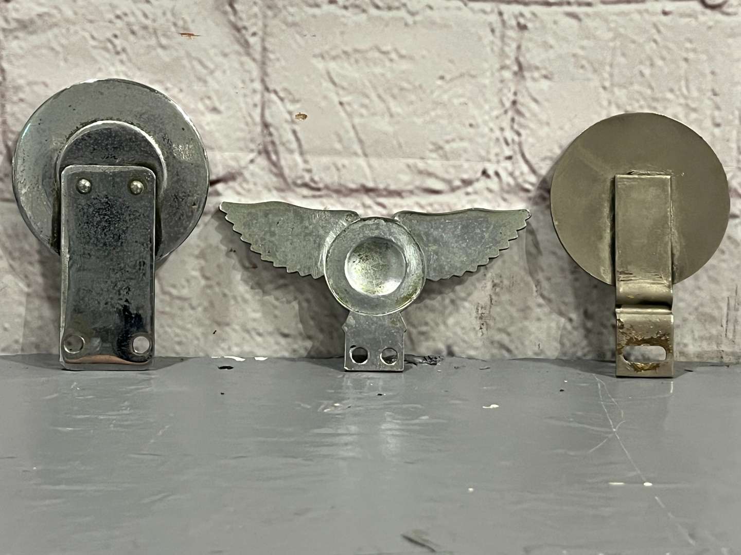 <p>Three Rolls Royce Car Badges&nbsp;</p>