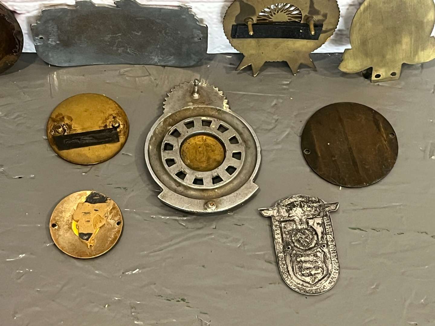 <p>Nine Enamel Classic Car Badges&nbsp;</p>