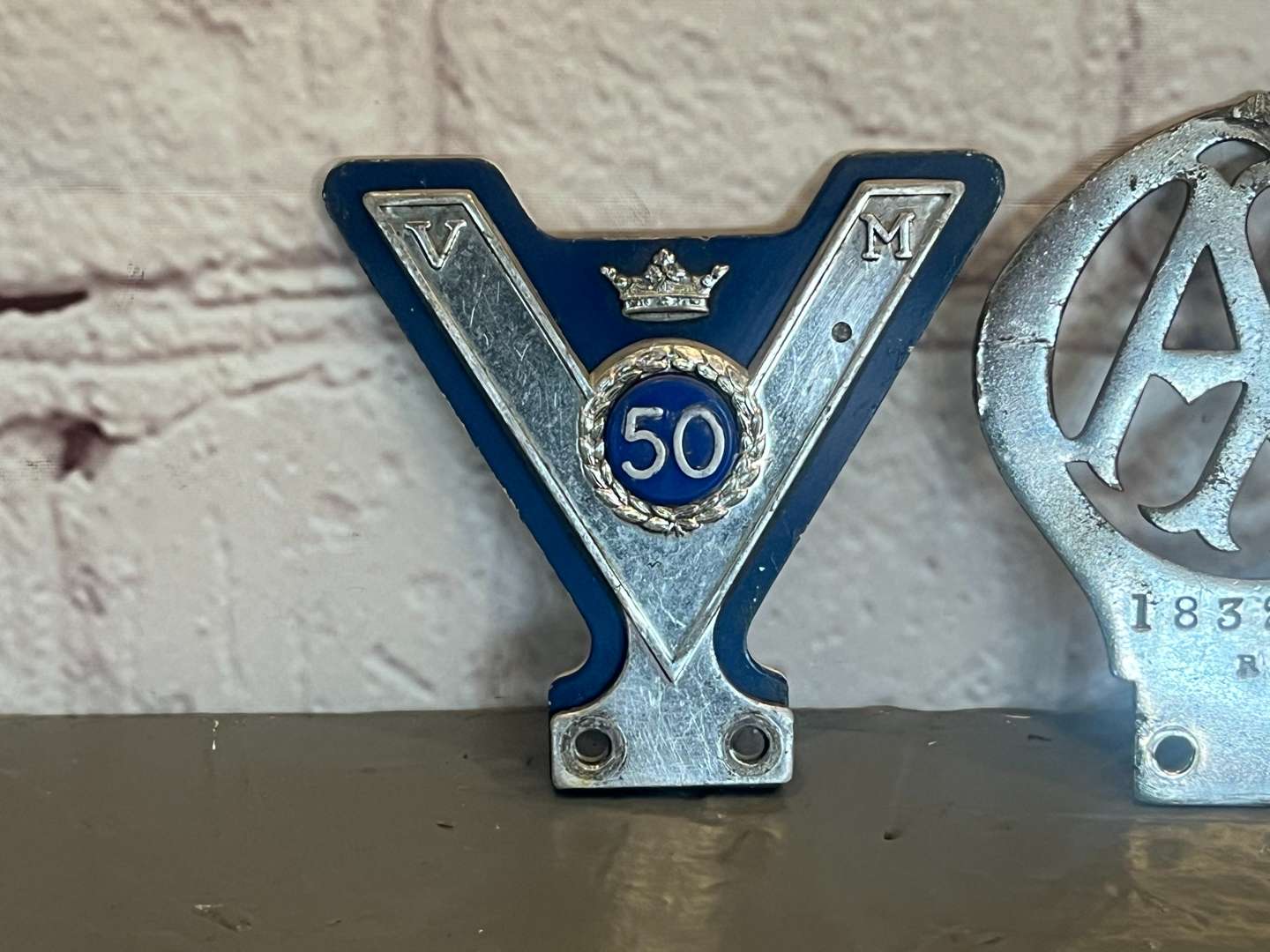 <p>VM50 Veteran Motorist Car Club Badge and AA Badge Numbered 18328H</p>