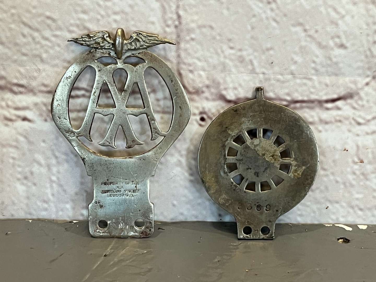 <p>Two Royal Automobile Club Associate Badge and AA Cycle Badge Numbered 384582</p>