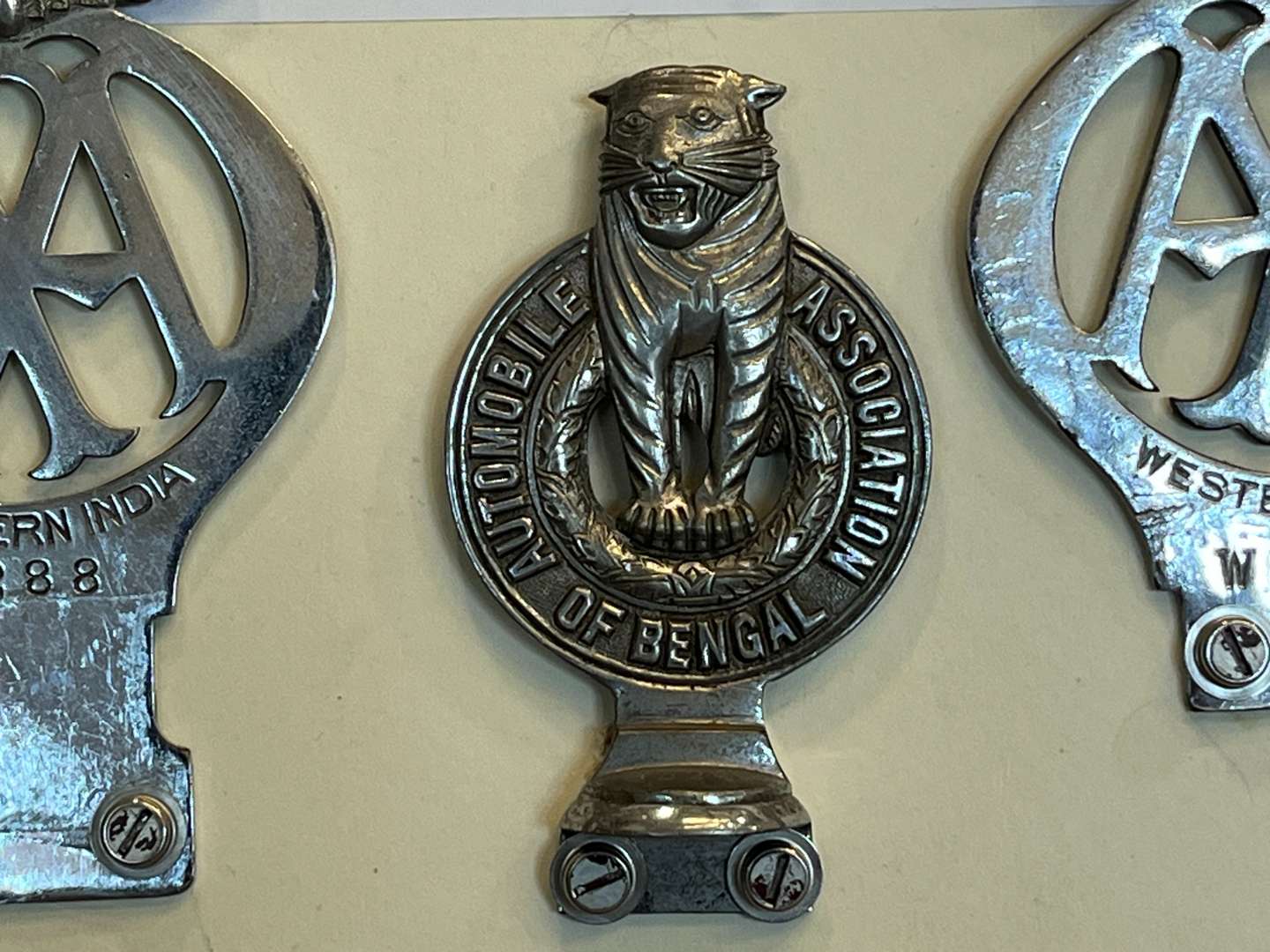 <p>Three Framed AA Indian Car Badges&nbsp;</p>