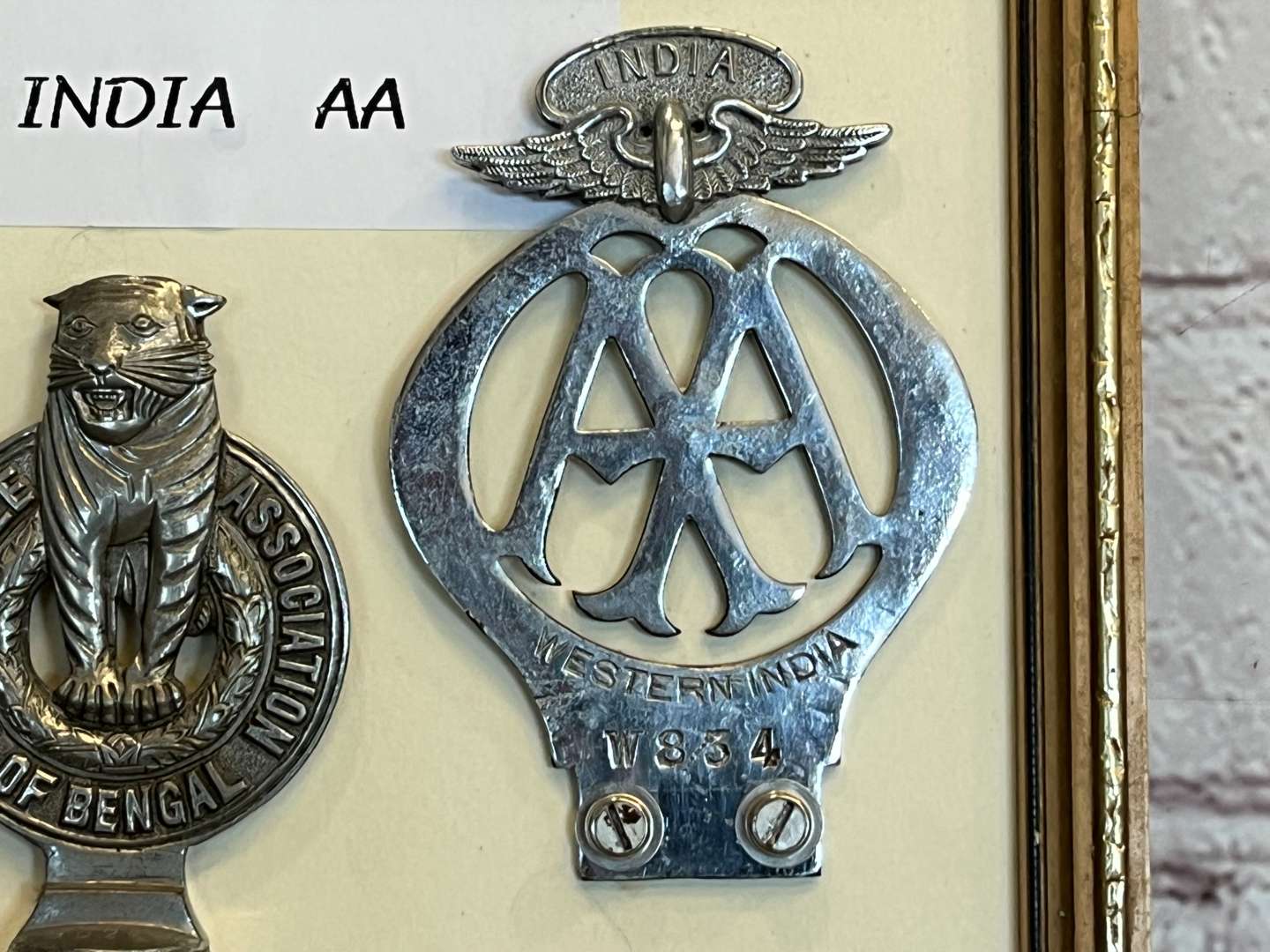 <p>Three Framed AA Indian Car Badges&nbsp;</p>