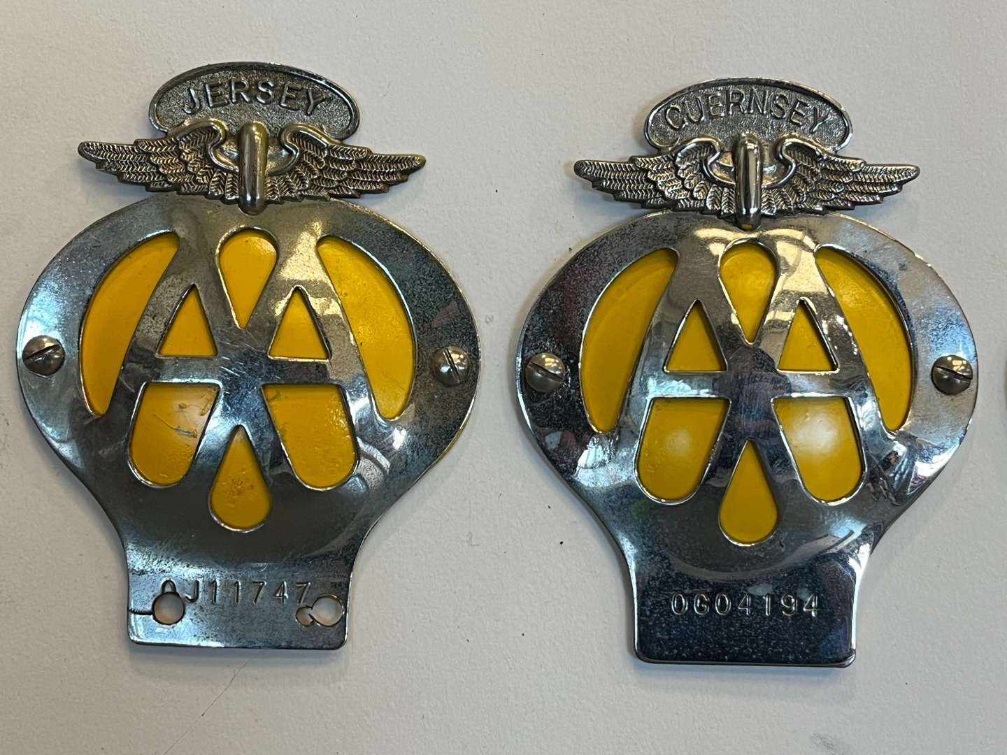 <p>Eight Framed AA Badges&nbsp;</p>