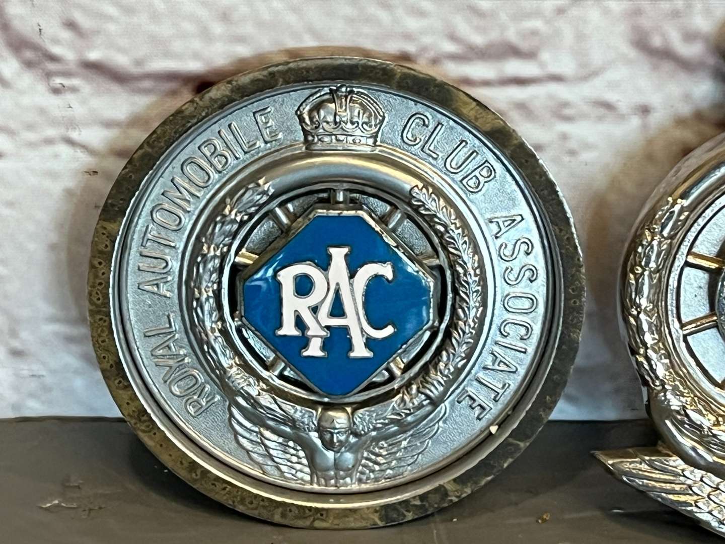 <p>Two RAC Car Club Badges</p>