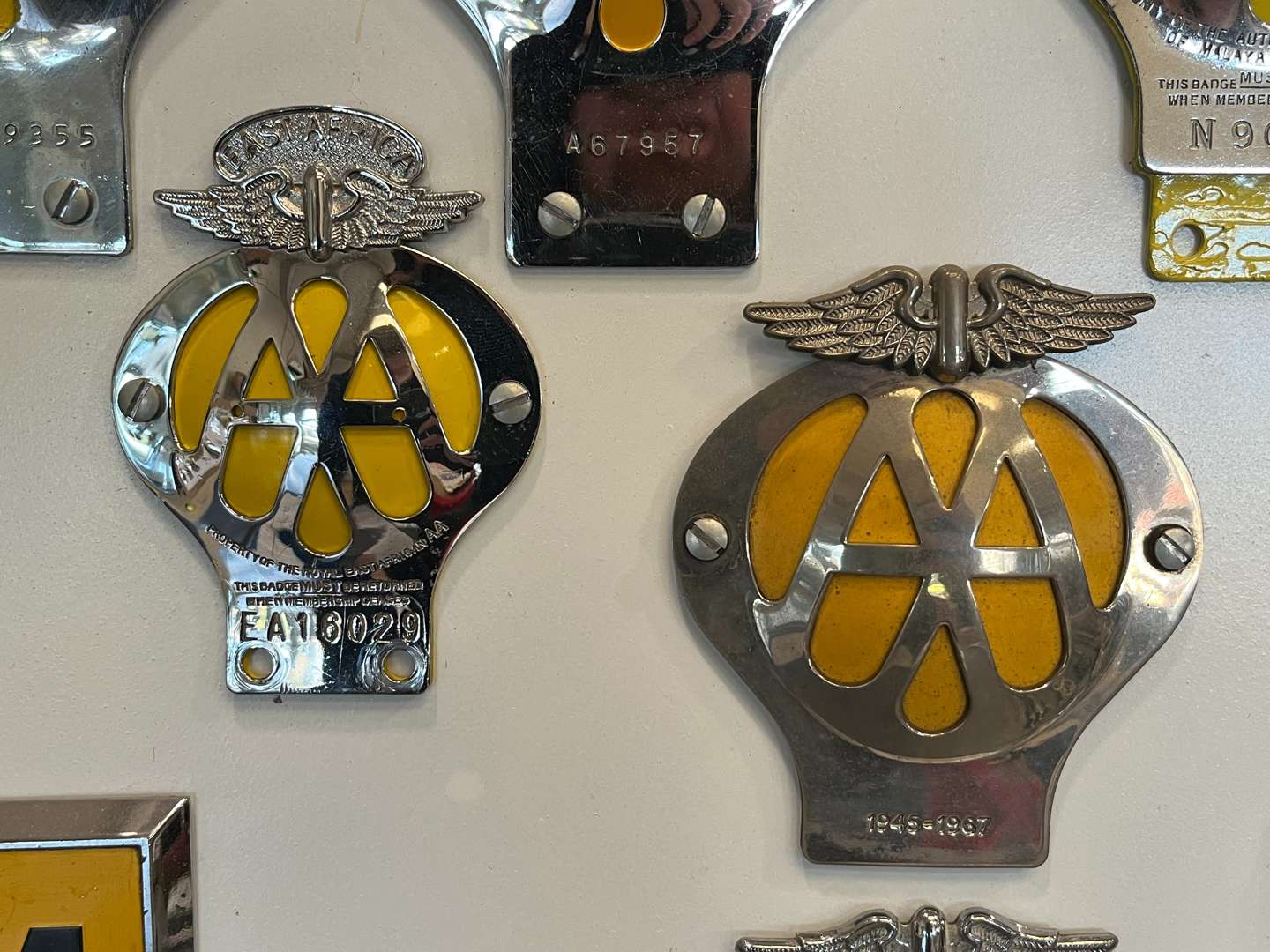 <p>Sixteen Framed Classic Car Badges&nbsp;</p>