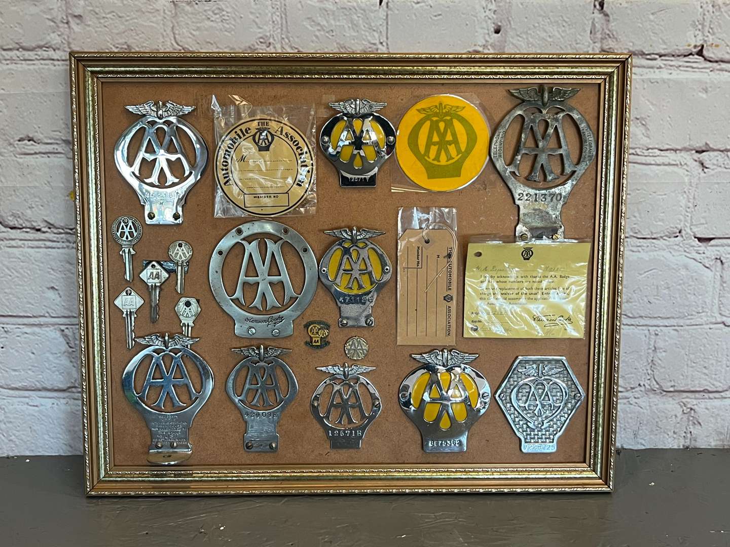 <p>Ten Framed AA Badges, To Include Stenson Cooke Etc</p>