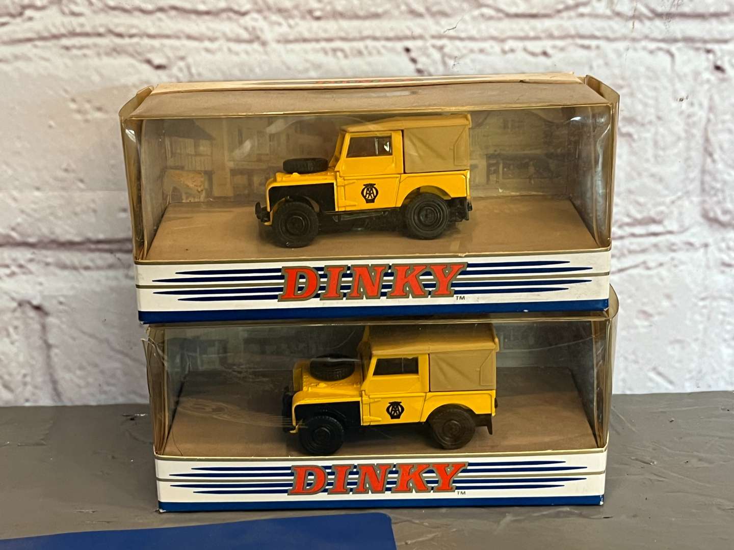 <p>Two Boxed AA Dinky Series One Land Rovers Together With Bentley Leather Patch and Card</p>