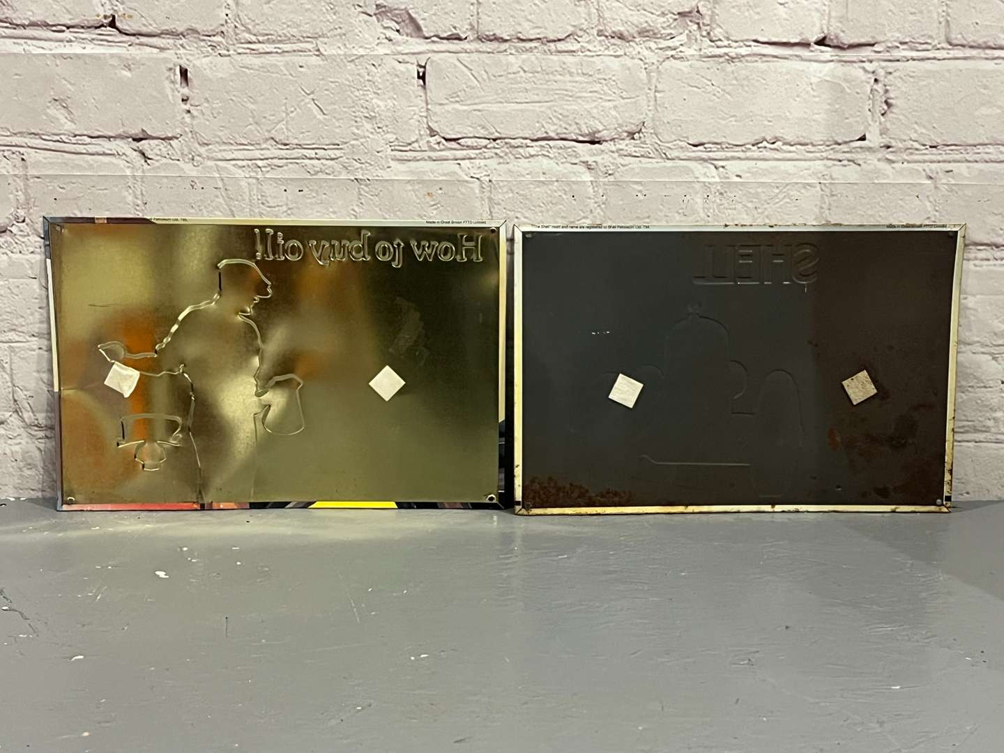<p>Two Tin Shell Signs</p>