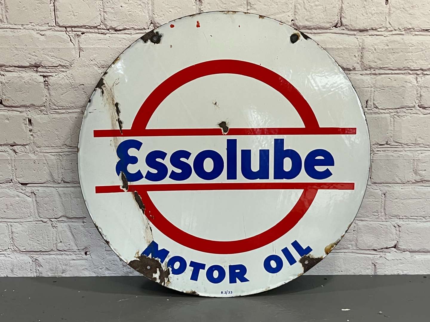 <p>Essolube Motor Oil Enamel Circular Sign</p>