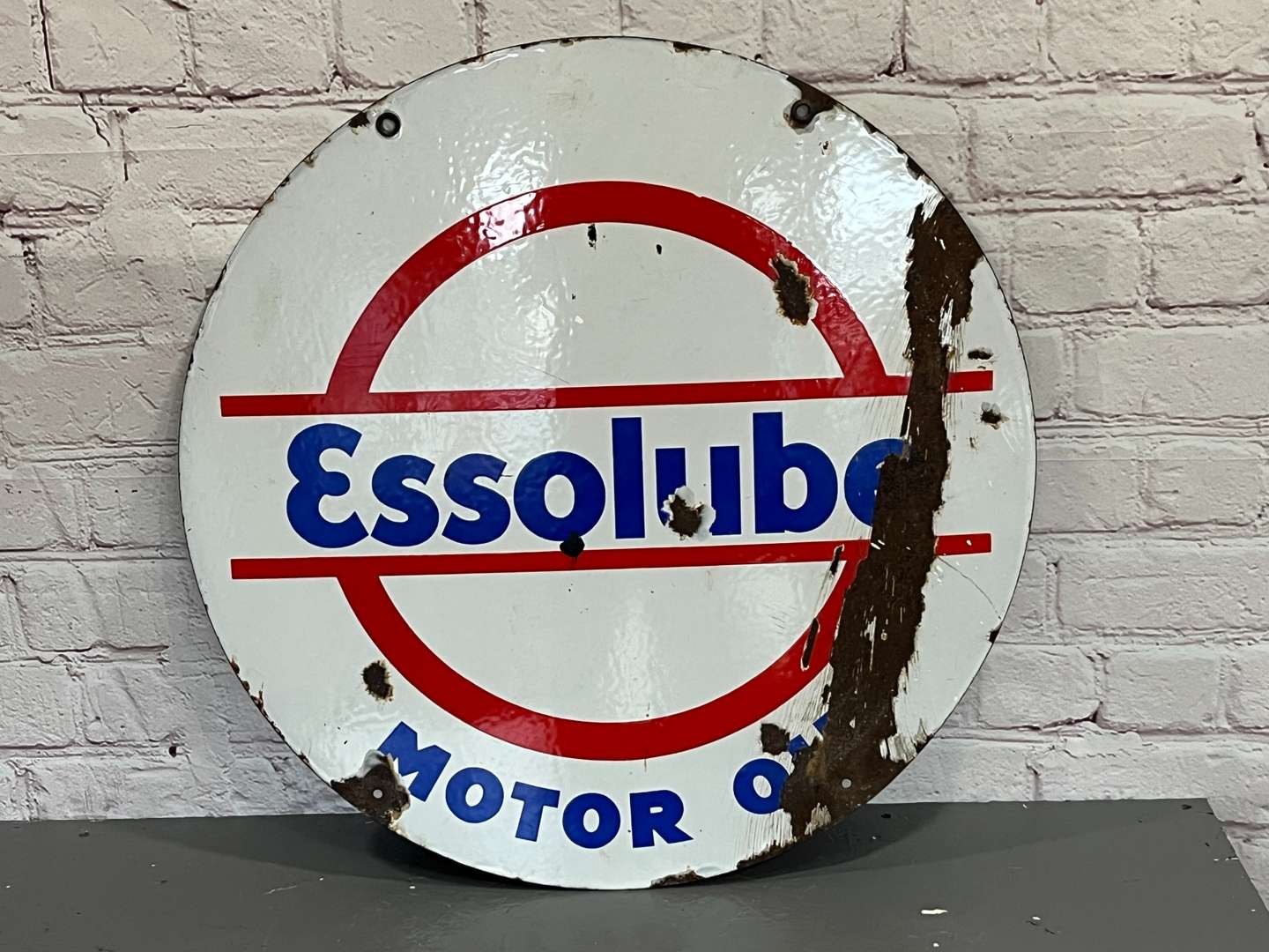 <p>Essolube Motor Oil Enamel Circular Sign</p>