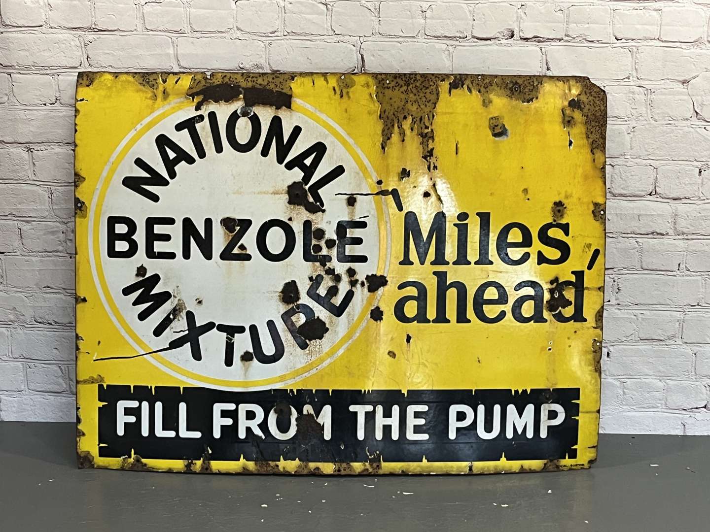 <p>National Benzole Mixtures “Miles Ahead” Enamel Sign</p>